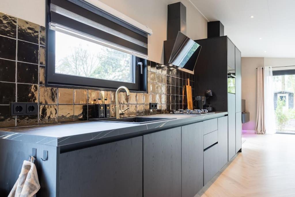 Veluwe Boutique Lodge พุทเทิน ภายนอก รูปภาพ